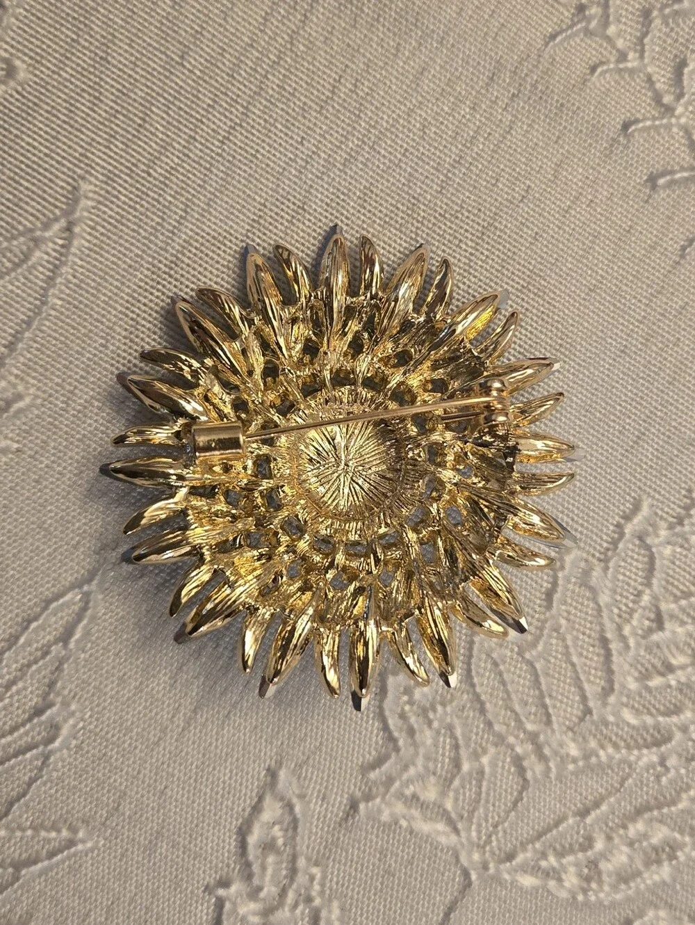 Gold-Tone Blue Crystal and Pearl Sunburst Brooch